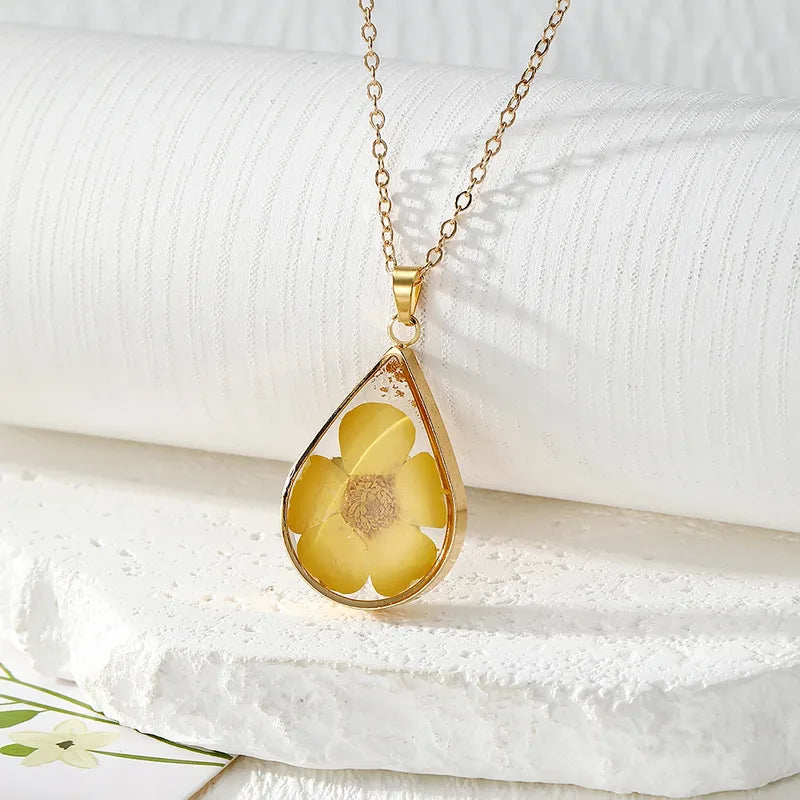 Resin Pendant - A Yellow Five-petal Flower