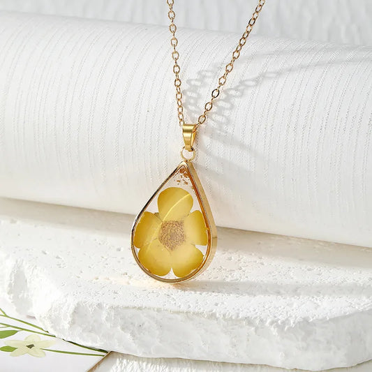 Resin Pendant - A Yellow Five-petal Flower